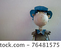 Sculpture of a boy built of metal 76481575