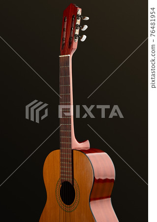 Classical acoustic guitar, black background 76481954