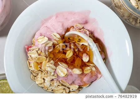 Homemade strawberry face mask close up. Homemade strawberry face mask close up. 76482919