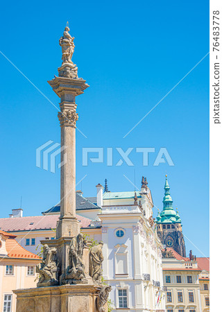 Marian Column or Holy Trinity at Hradcanske Square for bubonic plague pandemics in Prague, Czech Republic, details, closeup Marian Column or Holy Trinity at Hradcanske Square for bubonic plague pandemics in Prague, Czech Republic, details, closeup 76483778