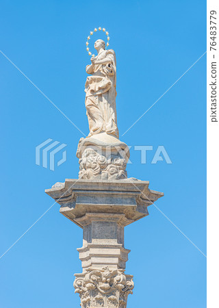 Marian Column or Holy Trinity at Hradcanske Square for bubonic plague pandemics in Prague, Czech Republic, details, closeup Marian Column or Holy Trinity at Hradcanske Square for bubonic plague pandemics in Prague, Czech Republic, details, closeup 76483779