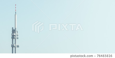 Banner with a communication TV tower in Prague downtown at blue sky with copy space for text, Czech Republic. 76483816