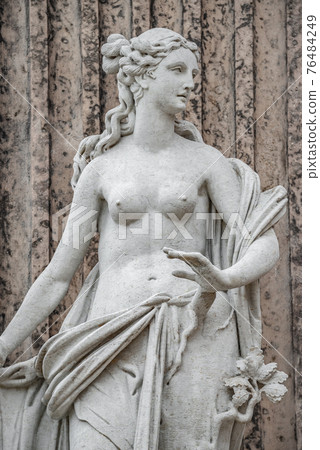 Statue of ancient sensual naked Renaissance Era woman in Potsdam, Germany, details, closeup 76484249