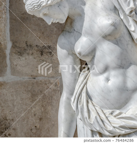 Ancient statue of a sensual renaissance era woman in Potsdam, Germany 76484286