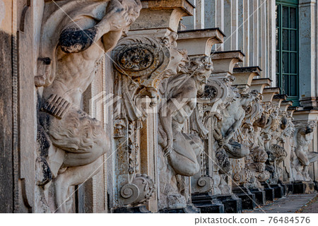 Row of old mythological and religious statues in the Zwinger palace and garden in downtown of Dresden, Germany Row of old mythological and religious statues in the Zwinger palace and garden in downtown of Dresden, Germany 76484576