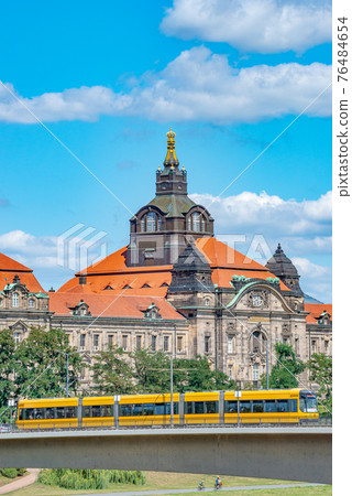 View of State Government Office in Dresden downtown across the river Elbe, Dresden, Germany, summer, blue sky 76484654