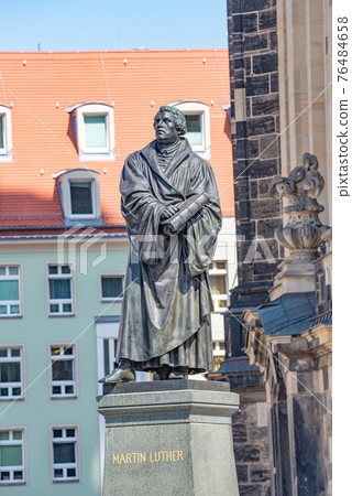 Monument of Martin Luther at  Neumarkt square in downtown of Dresden, a theologist, composer, priest, who has started Reformation in Catholic Church, Germany, details, closeup.. 76484658