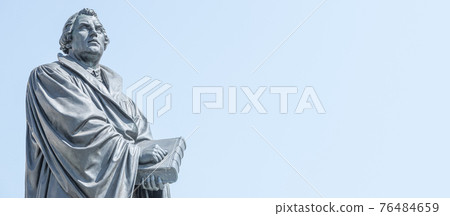 Banner with monument of Martin Luther at Neumarkt square in downtown of Dresden, a theologist, composer, priest, who has started Reformation in Catholic Church, with copy space for text, Germany, Banner with monument of Martin Luther at Neumarkt square in downtown of Dresden, a theologist, composer, priest, who has started Reformation in Catholic Church, with copy space for text, Germany, 76484659