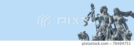 Banner with old statue of Dionis and Aridna quadriga with four panthers on the top of the State Opera House in downtown of Dresden, Germany, details, closeup, with copy space. 76484751