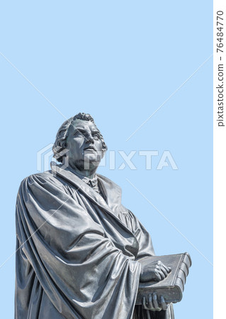 Monument of Martin Luther at  Neumarkt square in downtown of Dresden, a theologist, composer, priest, who has started Reformation in Catholic Church, with copy space for text, Germany, details, 76484770