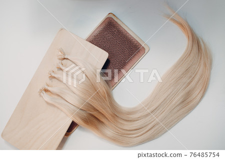 Micro Beads Nano Ring Human Hair Extensions on white background Micro Beads Nano Ring Human Hair Extensions on white background 76485754