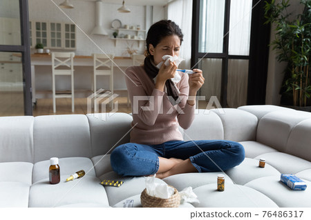 Sick young lady fight against fever measuring temperature take meds Sick young lady fight against fever measuring temperature take meds 76486317