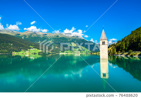 Submerged Bell Tower of Curon on Lake Reschen in South Tyrol, Italy 76488620