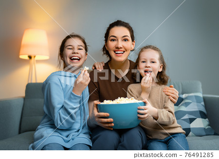 family watching TV family watching TV 76491285