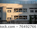 School building at dusk, after-school image 76492766