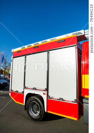 Modern fire fighter truck equipped with the latest tools for rescue operations Modern fire fighter truck equipped with the latest tools for rescue operations 76494119