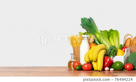 Grocery. box full of fruits and vegetables Grocery. box full of fruits and vegetables 76494224