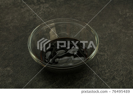 Asian cuisine - oyster sauce in the bowl Asian cuisine - oyster sauce in the bowl 76495489