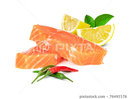 Piece of fresh salmon fillet sliced with lemon and chili isolated on white background Piece of fresh salmon fillet sliced with lemon and chili isolated on white background 76495576
