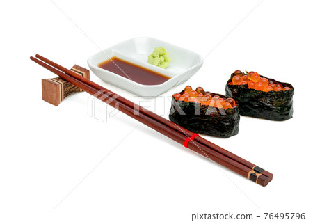 rolled sushi of salmon roe nigiri with japanese wasabi sauce and  wooden chopsticks isolated on white background ,include clipping path 76495796