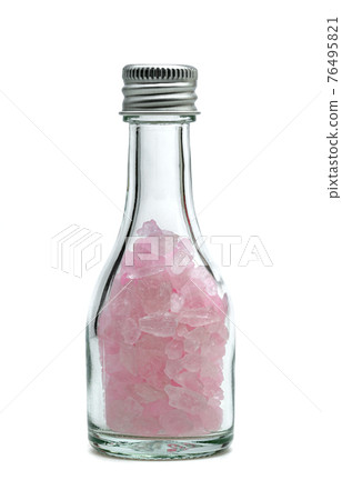 pink rock sugar or crystalline sugar glass bottle isolated on white background pink rock sugar or crystalline sugar glass bottle isolated on white background 76495821
