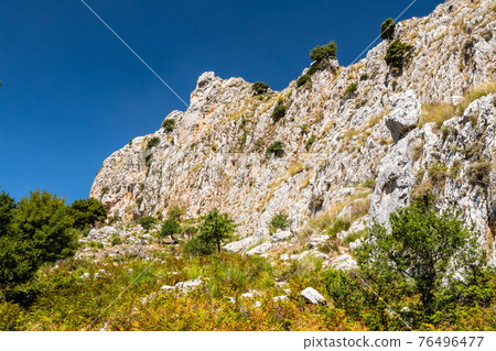 View of Rocca del Crasto near Alcara Li Fusi town in the Nebrodi Park, Sicily View of Rocca del Crasto near Alcara Li Fusi town in the Nebrodi Park, Sicily 76496477