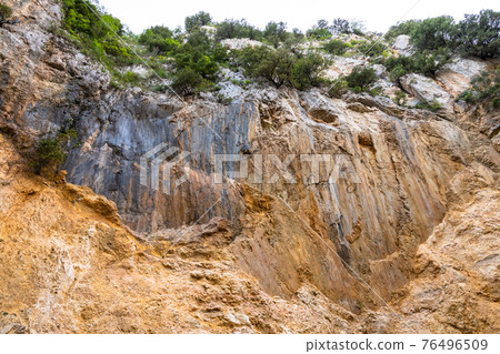 Typical sicilian landscape in the Nebrodi park near the Catafurco waterfalls 76496509