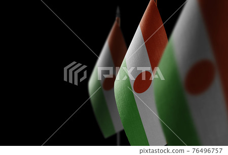 Small national flags of the Niger on a black background Small national flags of the Niger on a black background 76496757