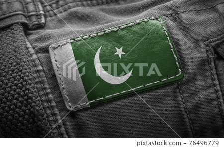 Tag on dark clothing in the form of the flag of the Pakistan Tag on dark clothing in the form of the flag of the Pakistan 76496779