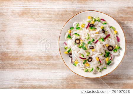 Konjac pasta with broccoli, shot from above with a place for text Konjac pasta with broccoli, shot from above with a place for text 76497038