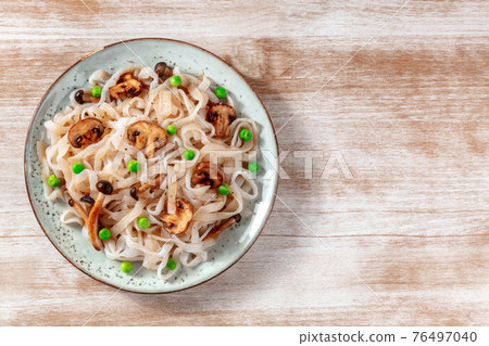 Konjac pasta with vegetables, shot from above with copy space Konjac pasta with vegetables, shot from above with copy space 76497040