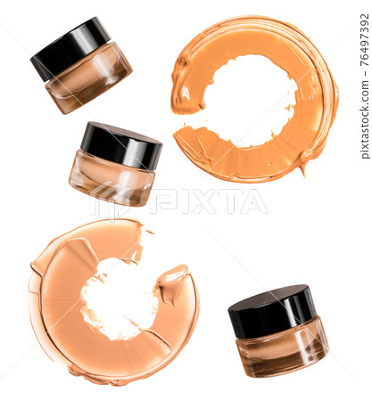 Nice 3 glass face make-up creme foundation in container with a black plastic lid and smeared creme, isolated on white background Nice 3 glass face make-up creme foundation in container with a black plastic lid and smeared creme, isolated on white background 76497392