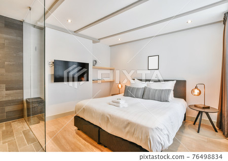 A cozy bedroom A cozy bedroom 76498834