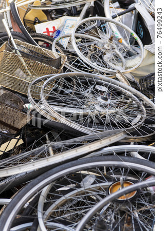 Discarded bicycle parts Discarded bicycle parts 76499243
