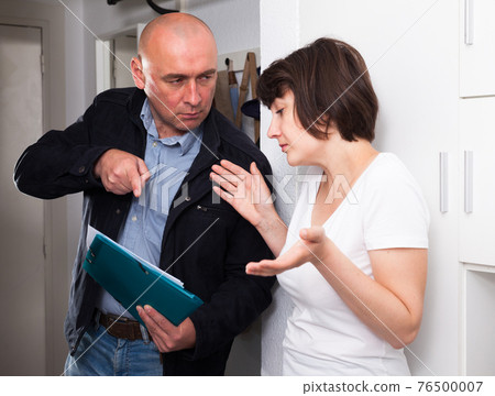 Collector is trying to get the arrears from woman at home door 76500007