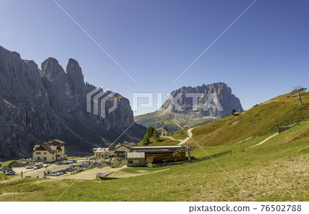 Magical Dolomite peaks of Pizes da Cir, Passo Gardena at blue sky and sunny day, South Tyrol, Italy 76502788
