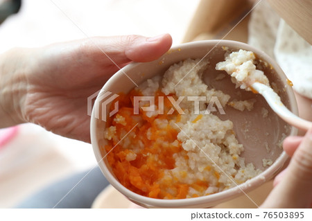 Baby food on a plate Baby food on a plate 76503895