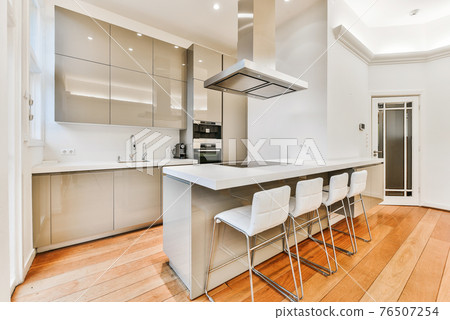 Interior of modern kitchen at home Interior of modern kitchen at home 76507254