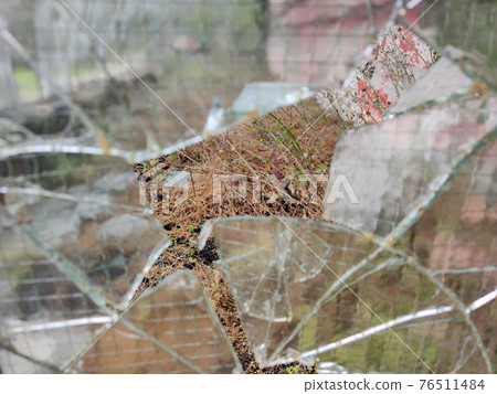 gun bullet broken window glass gun bullet broken window glass 76511484