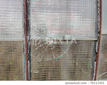 gun bullet broken window glass gun bullet broken window glass 76511491