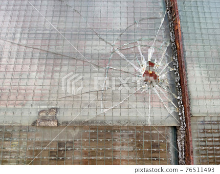 gun bullet broken window glass gun bullet broken window glass 76511493