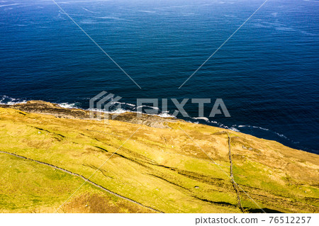 Aerial view of Dunmore Head by Portnoo in County Donegal, Ireland. Aerial view of Dunmore Head by Portnoo in County Donegal, Ireland. 76512257