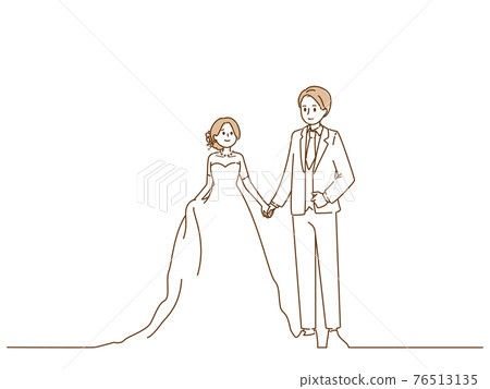 Bride and groom holding hands and looking at each other 76513135