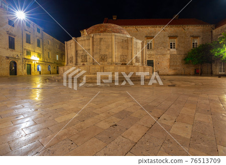 Dubrovnik. Stradun street in night illumination at dawn. Dubrovnik. Stradun street in night illumination at dawn. 76513709