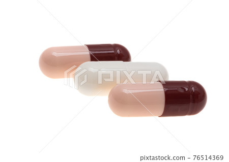 medicine in capsules isolated medicine in capsules isolated 76514369