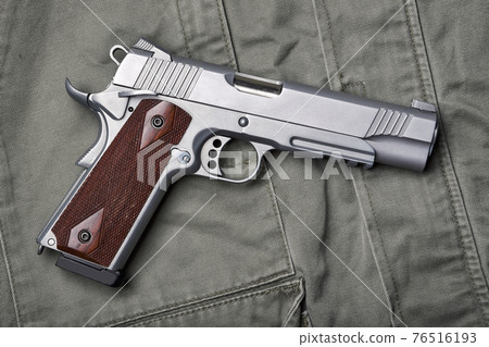 Weapons and military gun equipment for army, Semi-automatic handgun .45 pistol 76516193