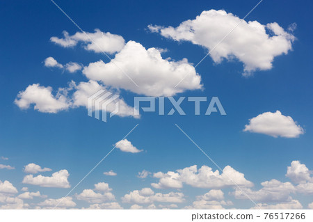 many white clouds of interesting shapes, against a blue sky, arranged chaotically, landscape many white clouds of interesting shapes, against a blue sky, arranged chaotically, landscape 76517266