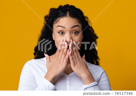 No Way. Portrait Of Impressed Happy Black Woman Covering Mouth With Hands No Way. Portrait Of Impressed Happy Black Woman Covering Mouth With Hands 76517346