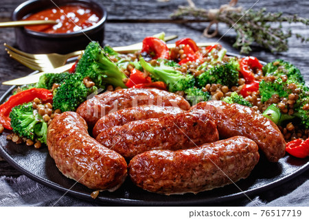 Italian cotechino sausages with lentils, top view Italian cotechino sausages with lentils, top view 76517719