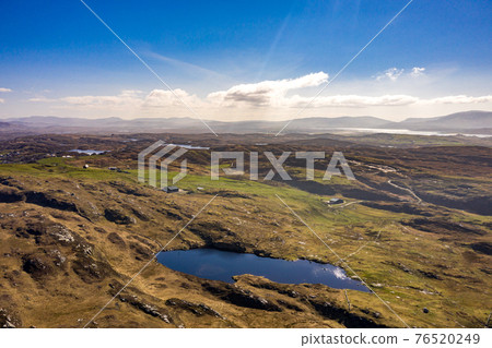 Aerial view of Lough Free at Dunmore Head by Portnoo in County Donegal, Ireland. 76520249